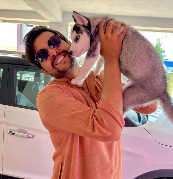 Sourav Chakraborty with a Husky dog