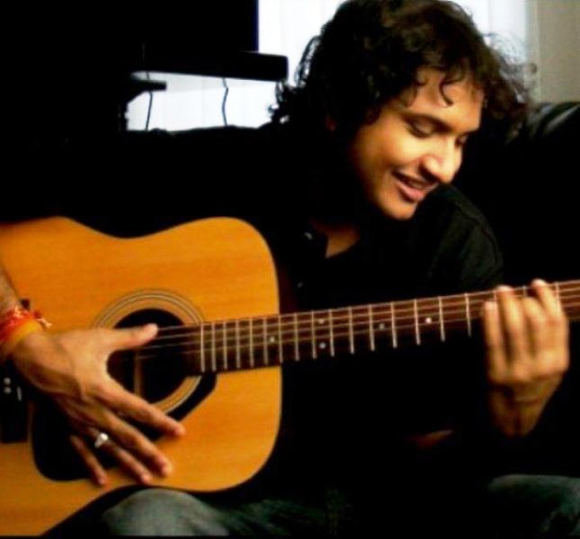 Sumit Kumar playing guitar