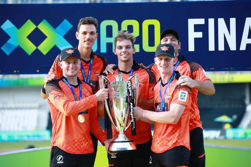 Tristan Stubbs posing with other players of Sunrisers Eastern Cape after winning the 2022–23 SA20 cricket league