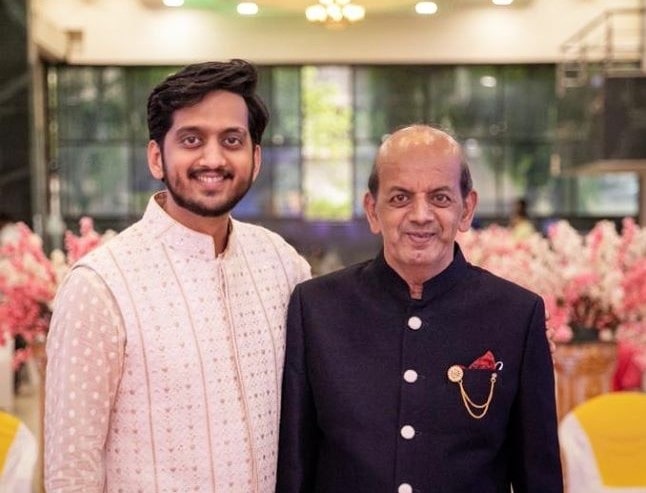A photo of Amey with his father taken during an event