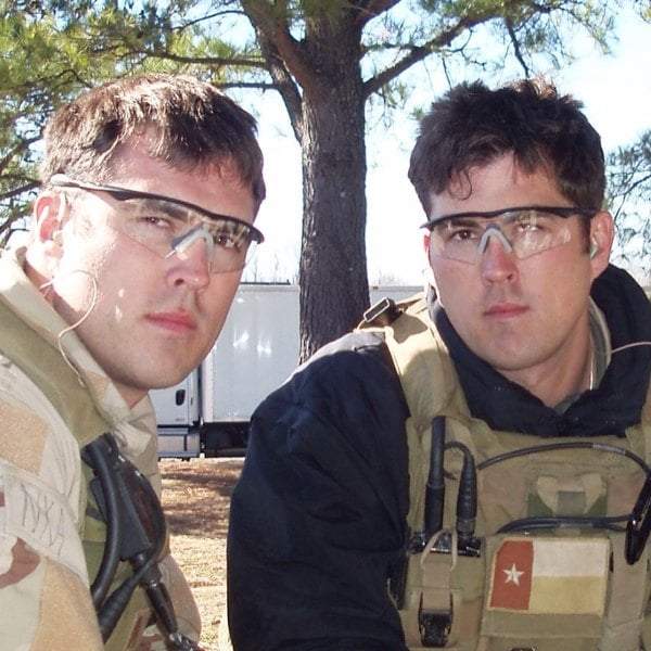 A photo of Marcus Luttrell (right) taken while he was serving in the US Navy SEALs