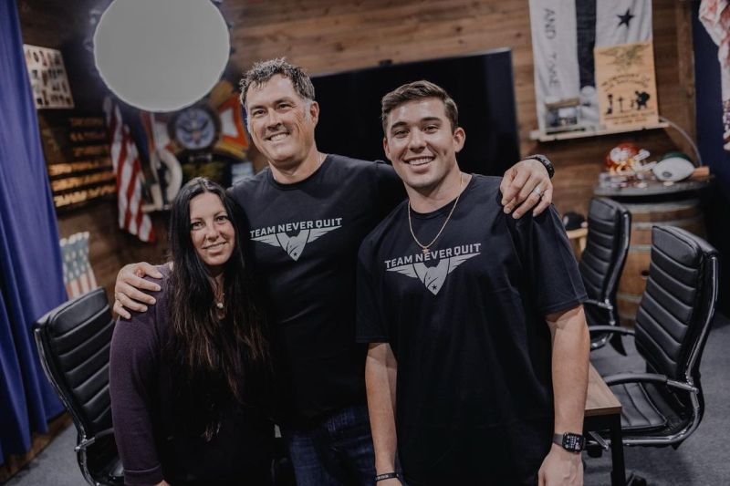 A photo of Marcus Luttrell with his wife and step-son