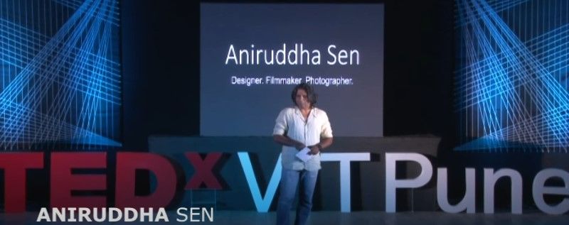 A photograph of Oni Sen speaking at the TEDx event
