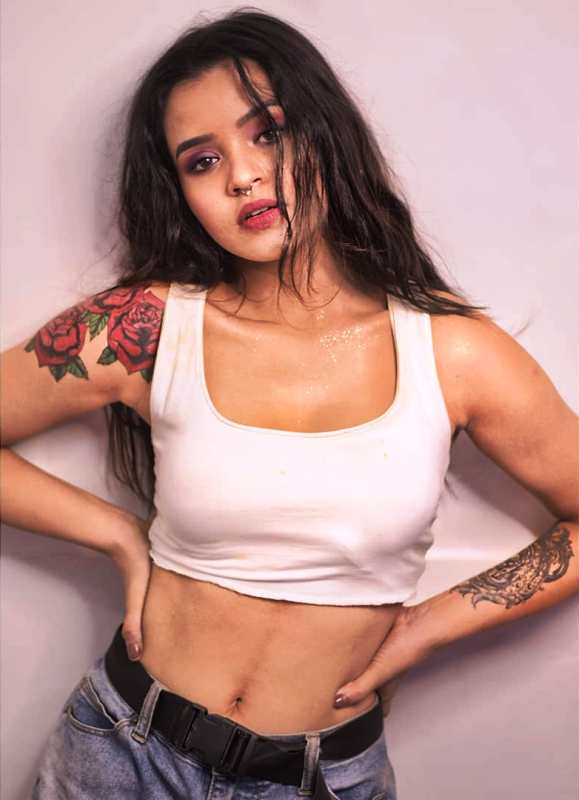 A picture featuring Pery Sheetal's tattoos