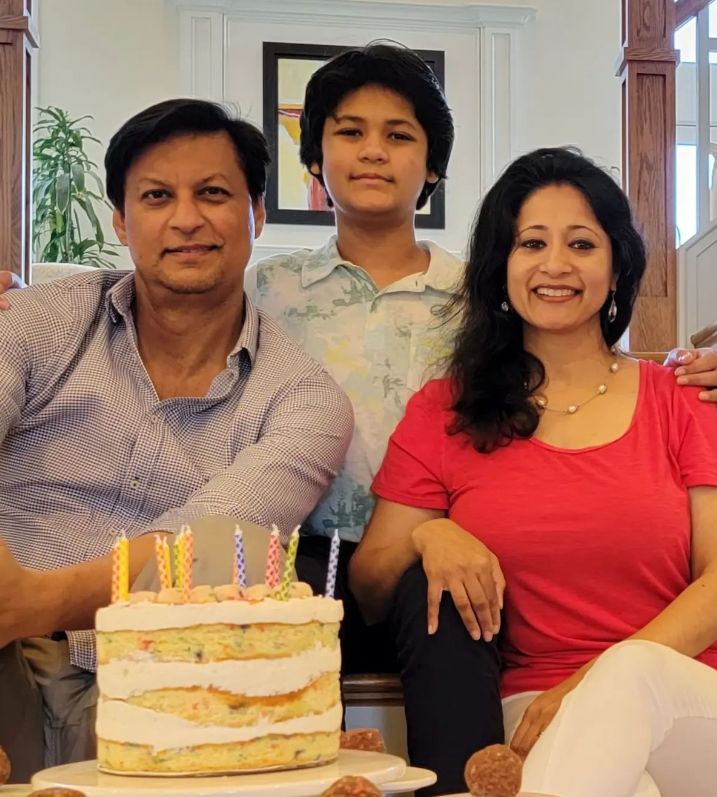 A picture of Kairan Quazi with his father and mother