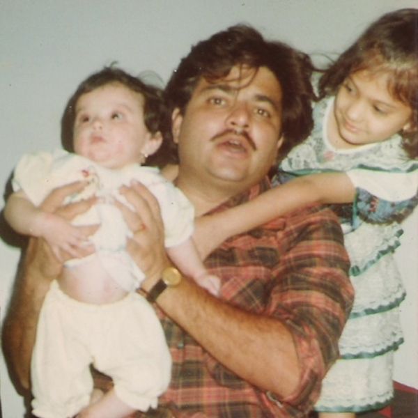 A young age image of Prashant Damle with his daughters