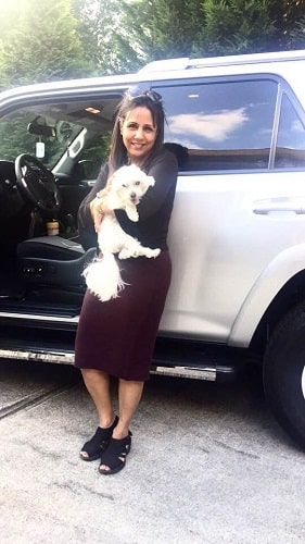 Aisha Pirani and a dog