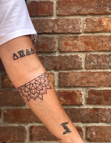 Alaina Scott's left forearm tattoos