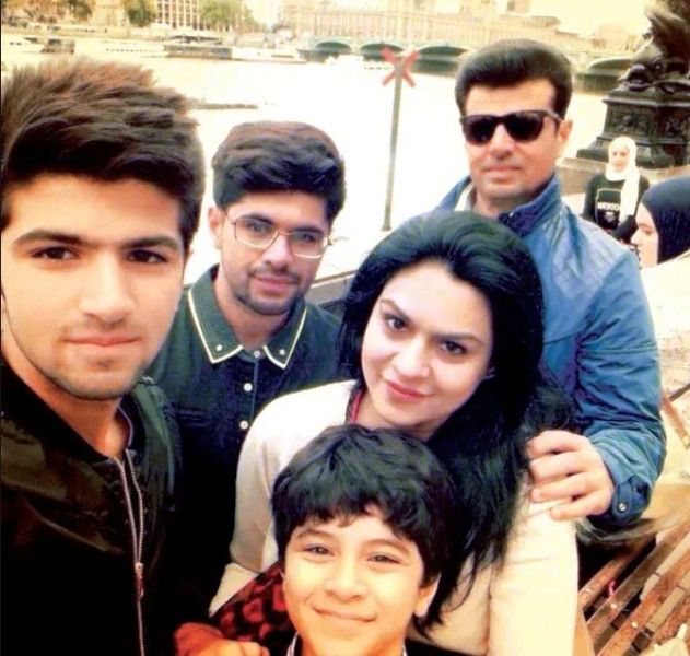 Aleem Dar with his wife, Noshaba, and sons, Hassan, and Ali