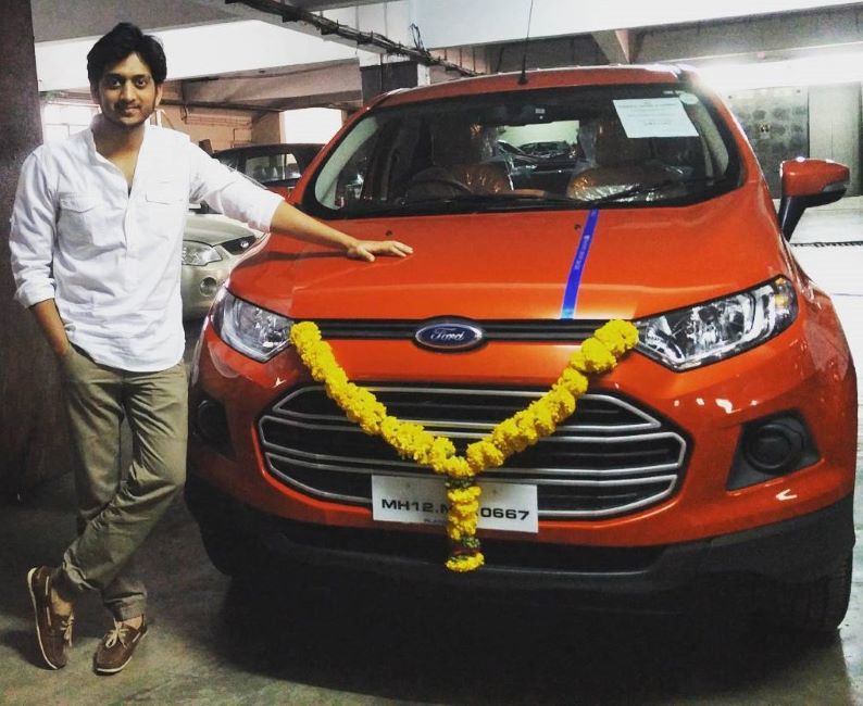 Amey Wagh standing next to his new Ford EcoSport