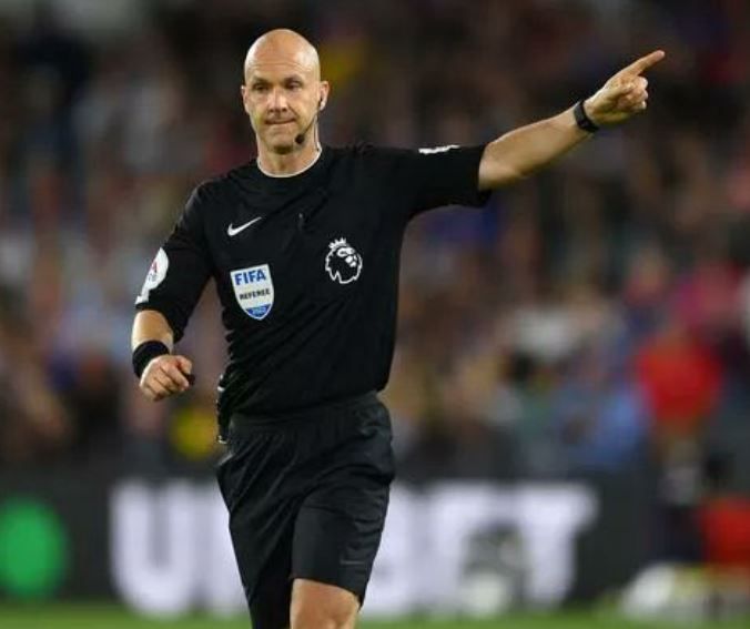 Anthony Taylor refereeing during an international match