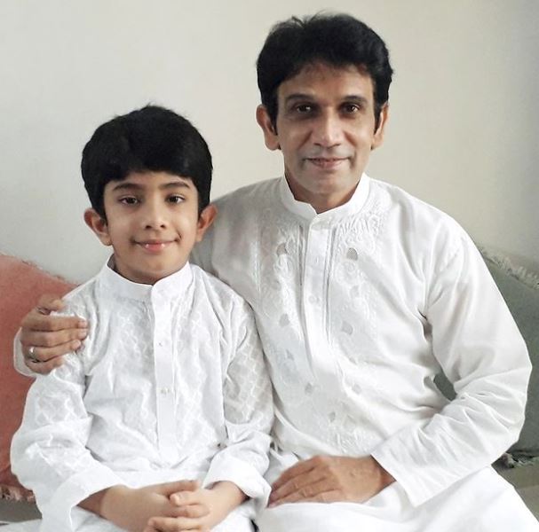Badrul Islam with his son