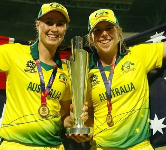 Georgia Wareham and her teammate with the 2023 ICC Women's T20 World Cup