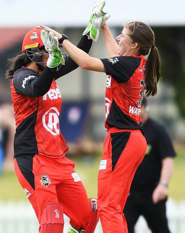 Georgia Wareham celebrating the fall of a wicket for the Melbourne Renegades Women