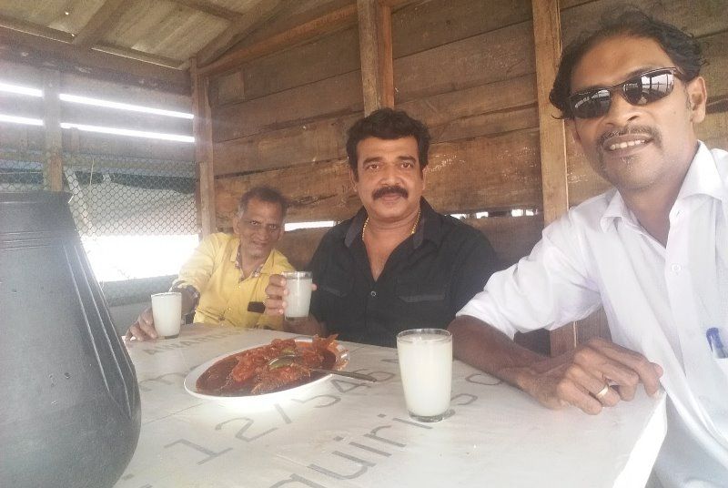 Harish Pengan and his friends were spotted in a toddy shop holding a glass of palm wine