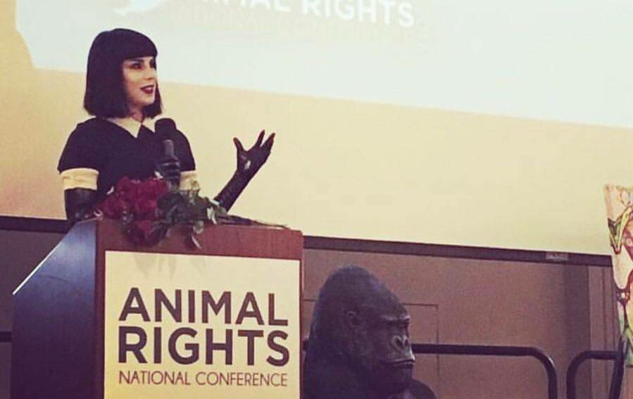 Kat Von D speaking at an animal rights program