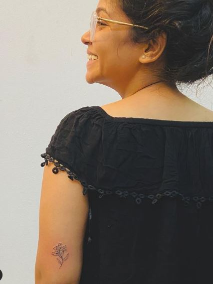 Lekha Jambaulikar's white lily tattoo