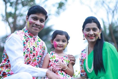 Myra Vaikul with her parents
