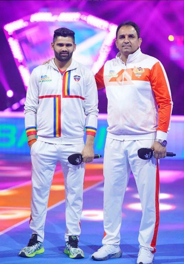 Pardeep Narwal with his coach Ram Mehar Singh