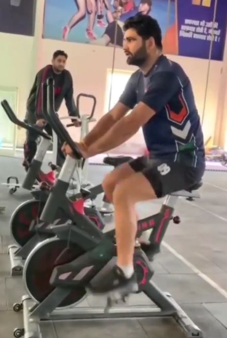Pardeep Narwal working out in the gym