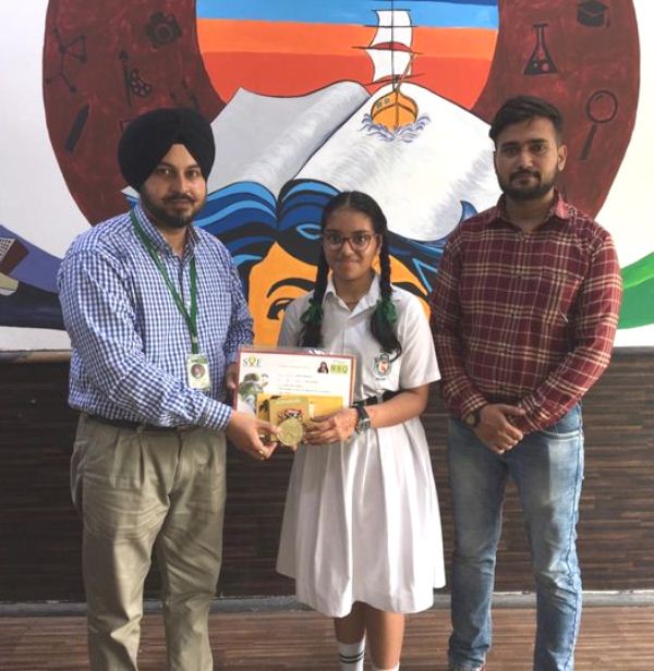 Pranjal Aggarwal receiving her prize for securing 1st position at Zonal Level National Science Olympiad