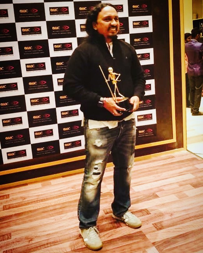 Prasad Sutar posing with the 24 FPS Award for Padmaavat (2018) won by NY VFXWAALA team