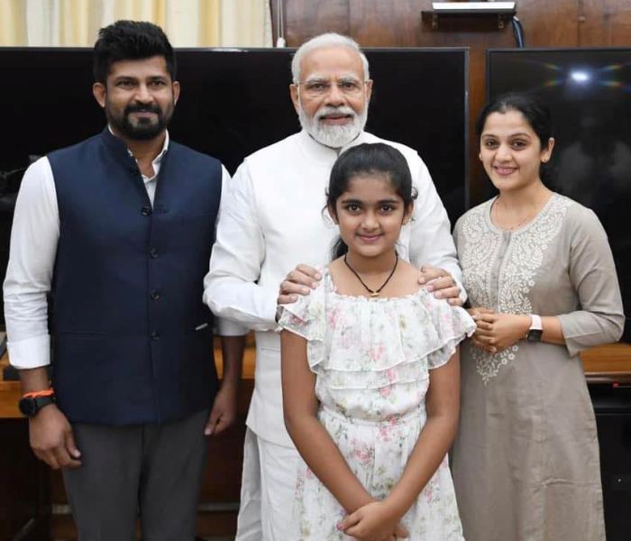 Pratap Simha with Prime Minister Narendra Modi, his wife, Arpitha Simha, and his daughter