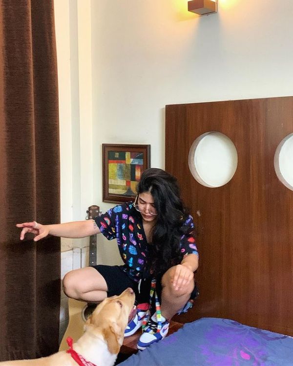Priyanka Gupta with a dog