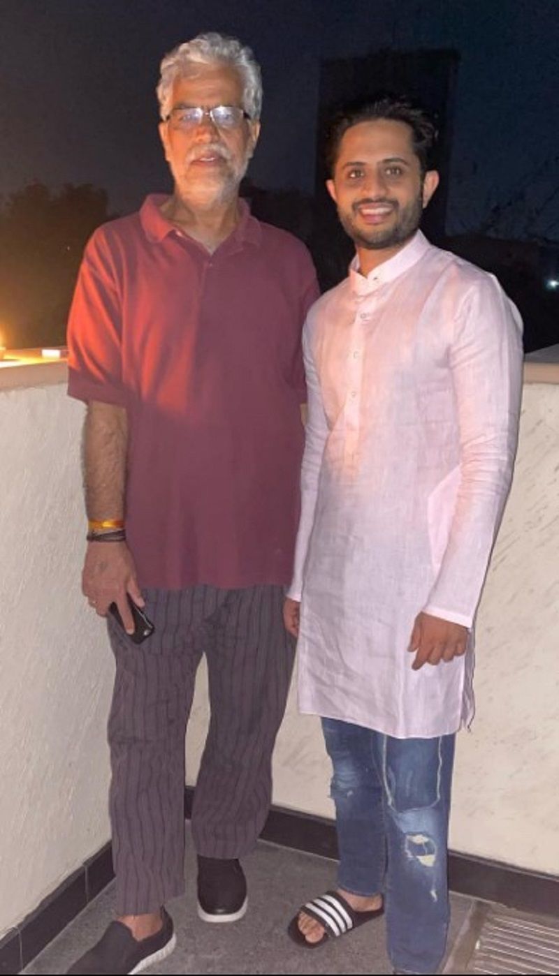 R.K. Arora with his son