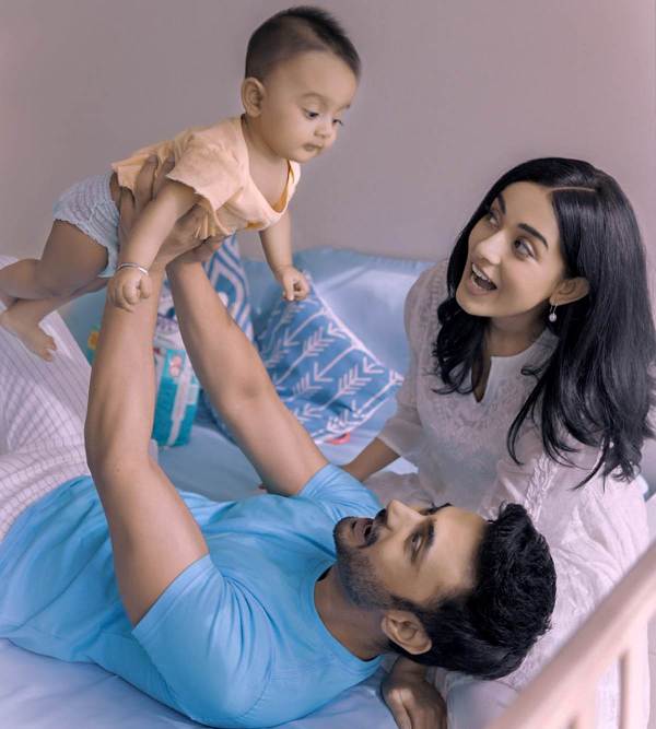 RJ Anmol with his wife, Amrita Rao, and son, Veer