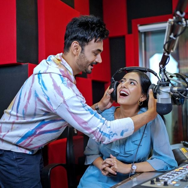 RJ Anmol with his wife, Amrita Rao, during a radio show
