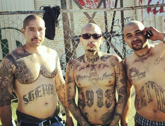 Rafael Reyes (centre) with other members of Sherman 27th Street Grant Hill Park gang