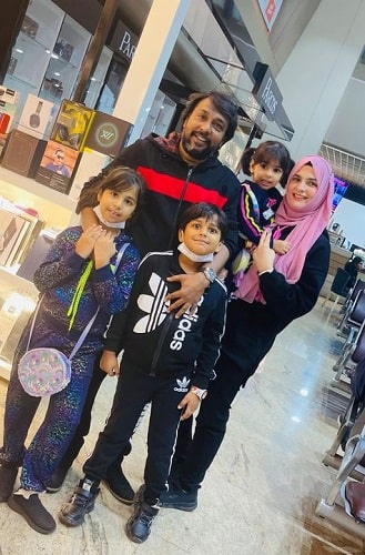 Shabbir Ahmed with his wife and children