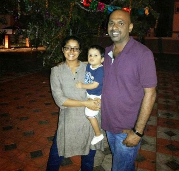 Shelly Kishore with her husband and son
