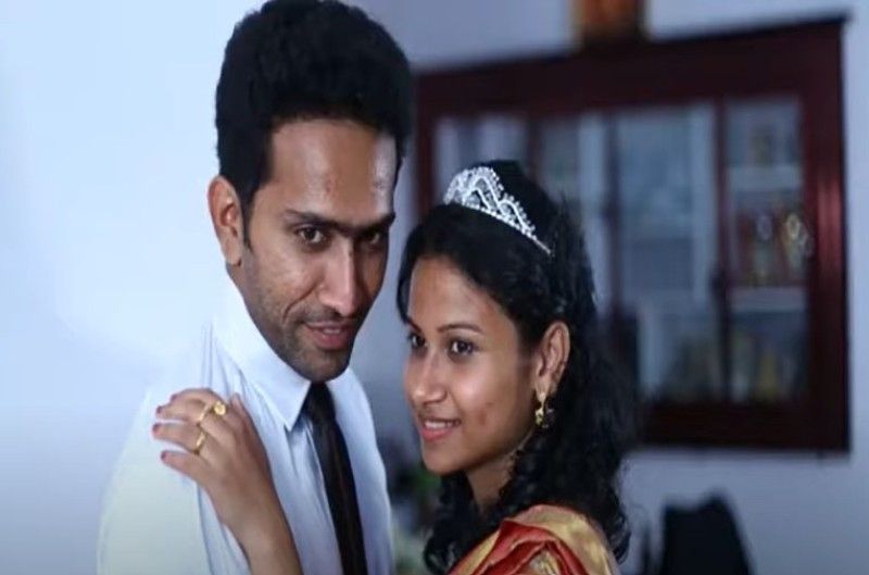 Shine Tom Chacko with his wife