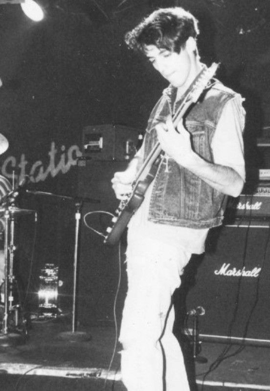 Valter Longo playing guitar in his teenage