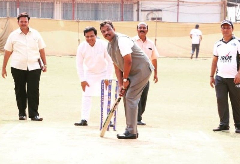 Vinod Tawde batting in a cricket match