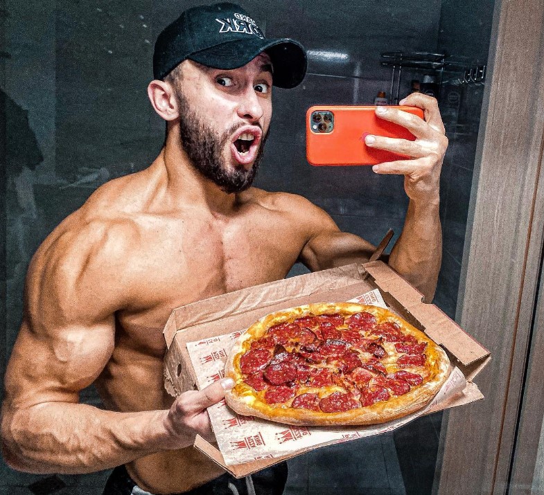 Vladimir Shmondenko enjoying pizza on his cheat meal day