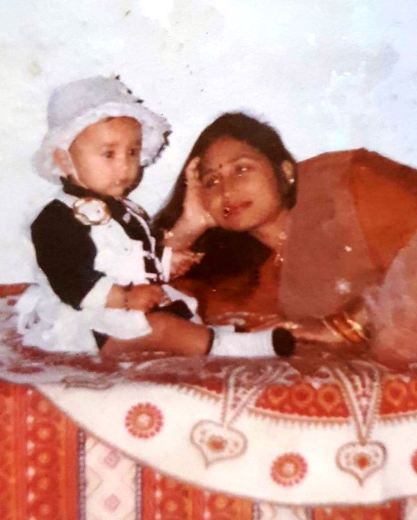 A photo of Akanksha Sharma as a toddler with her mother