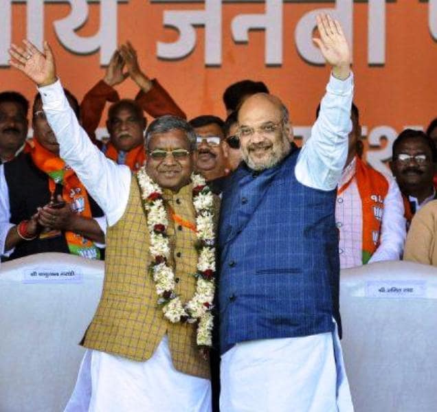 A photo of Babulal Marandi with Amit Shah after merging his party with the BJP
