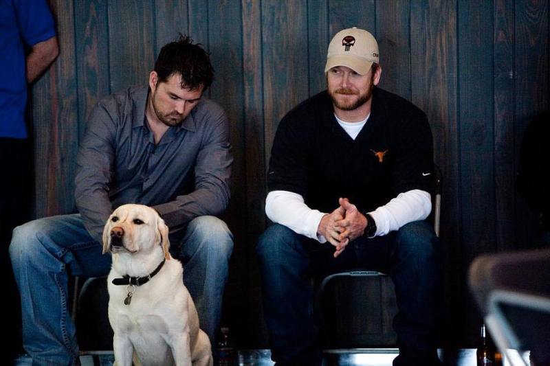 A photo of Marcus Luttrell with Chris Kyle