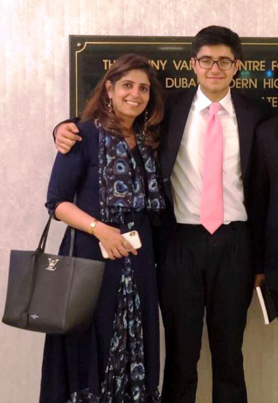 Aadit Palicha with his mother