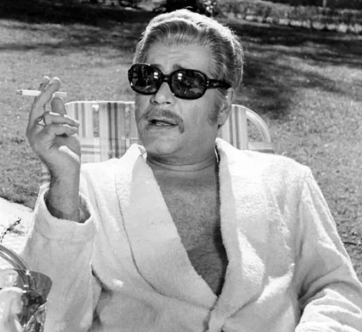 Ajit Khan enjoying a cigarette