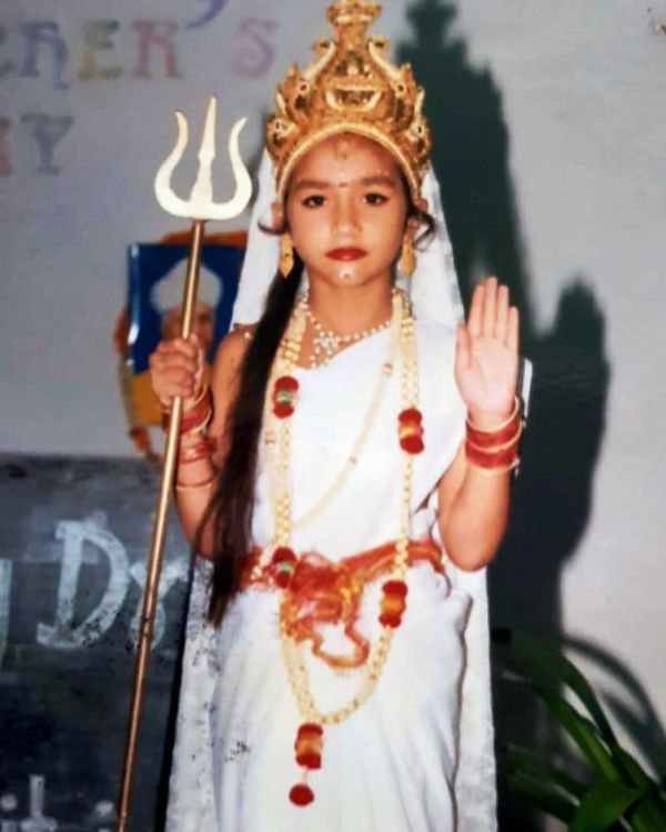 Akanksha Sharma dressed as a goddess during a play in school