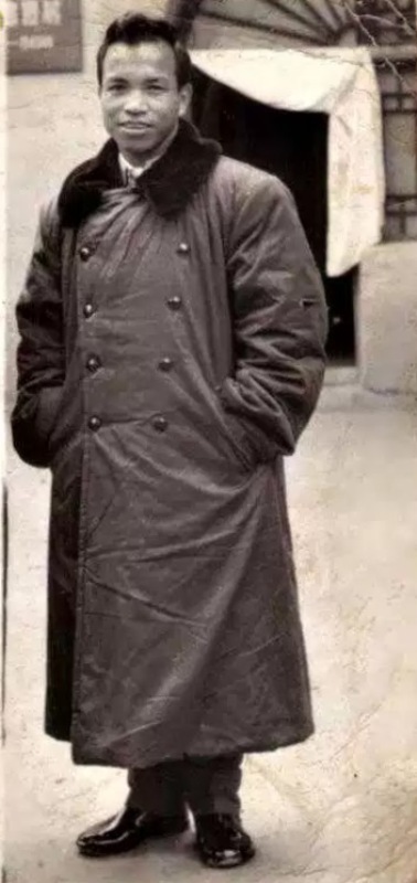 An old picture of Zoramthanga wearing an overcoat and standing somewhere in China in 1970
