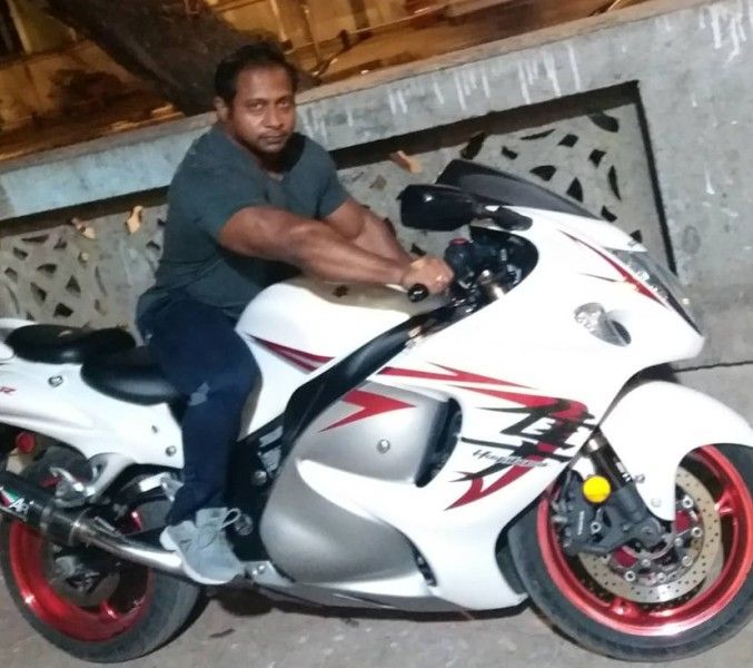 Ashish Sakharkar sitting on his Suzuki Hayabusa bike