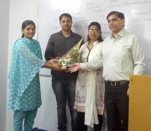 D. N. Pandey, Jyoti Maurya, and her husband, Alok Maurya (right to left) after she cleared the UPPSC 2015 examinations