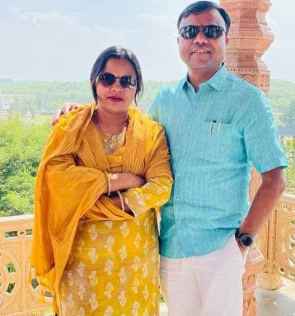 Deepak Baij posing with his wife, Poonam Baij