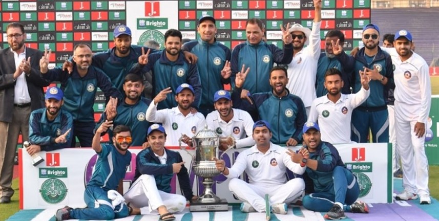 Faheem Ashraf (standing second from right) while celebrating the victory of his team during the Central Punjab's squad for the 2019-20 Quaid-e-Azam Trophy tournament