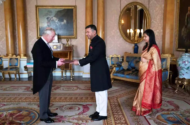 Indian High Commissioner to the UK Vikram Doraiswami presenting the Letters of Commission to Britain's King Charles during an audience at Buckingham Palace
